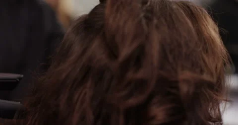 Young man getting hair styled in a salon. Shot on RED Epic. Stock Footage 59737691
