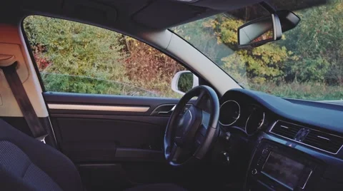 Young Man Getting Ready to Drive a Car, 4K. Sunny Autumn, Lens Flare. 스톡 동영상 67223591