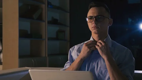 Young man getting ready for an online interview, videoconference, 4k footage Stock Footage 98303752