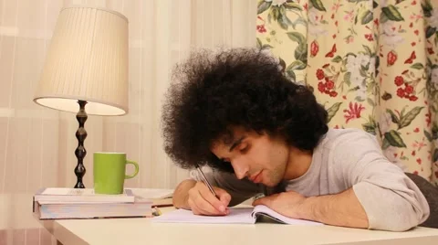Young man getting sleepy while studying 2 Video stock 3371094