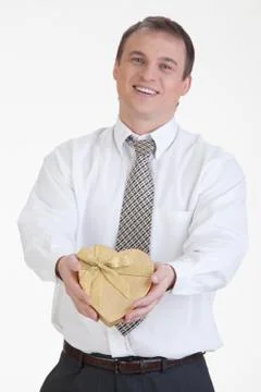 Young Man With A Gift Stock Photos