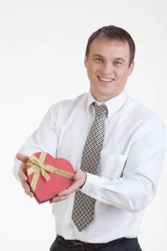 Young Man With A Gift Stock Photos