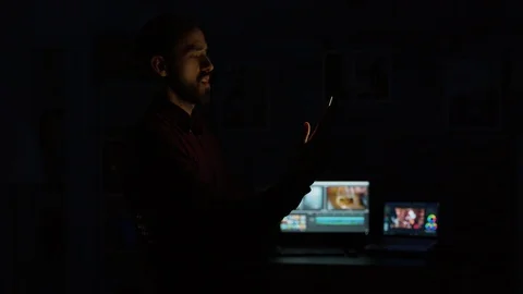 Young man giving a voice command to a smart light app Stock Footage 122626807