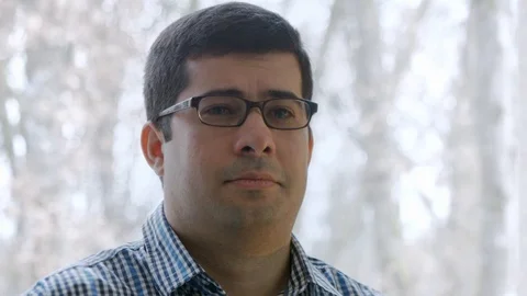 Young man with glasses crying Stock Footage 101793464