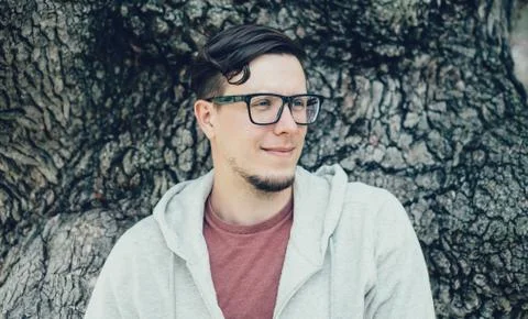 Young man in glasses Stock Photos