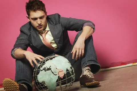 Young Man With Globe Stock Photos