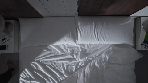 Young man goes to bed at nigth Видео 71363971