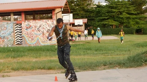 Young Man Goes Rollerblading in slow motion,outdoor activities in summer,roller Stock Footage 110828876