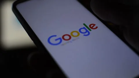 Young man with google internet logo on his office, phone internet communication Video stock 170476195