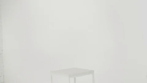 Young man in a grey shirt using a laptop 스톡 동영상 80358353