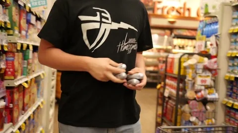 Young Man Grocery Shopping Stock Footage 74767231