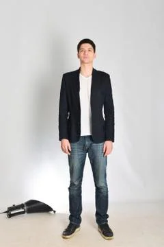 Young man, guy emotionally posing in the studio - isolated Stock Photos