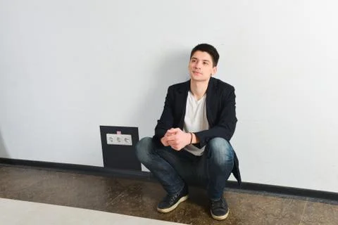 Young man, guy emotionally posing in the studio - isolated Stock Photos