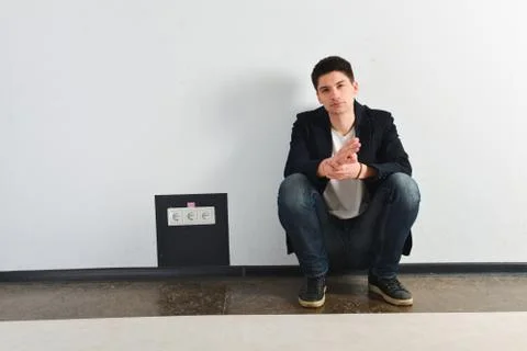 Young man, guy emotionally posing in the studio - isolated Stock Photos