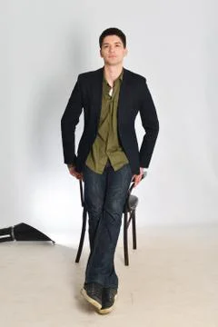 Young man, guy emotionally posing in the studio - isolated Stock Photos