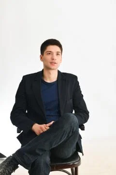 Young man, guy emotionally posing in the studio - isolated Stock Photos