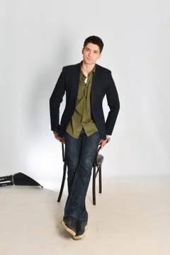 Young man, guy emotionally posing in the studio - isolated Stock Photos