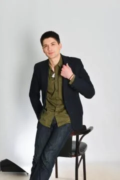 Young man, guy emotionally posing in the studio - isolated Stock Photos