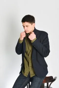 Young man, guy emotionally posing in the studio - isolated Stock Photos