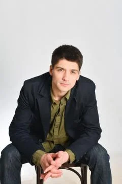 Young man, guy emotionally posing in the studio - isolated Foto stock