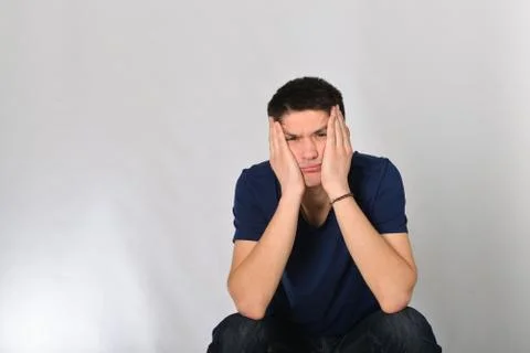 Young man, guy emotionally posing in the studio - isolated Stock Photos