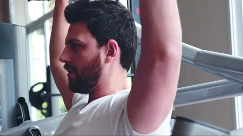 Young man in the gym Stock Footage 65793879