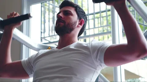 Young man in the gym 스톡 동영상 65793989