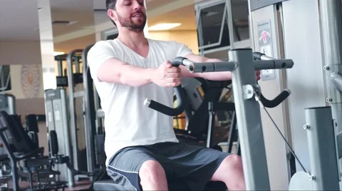 Young man in the gym 스톡 동영상 65794225