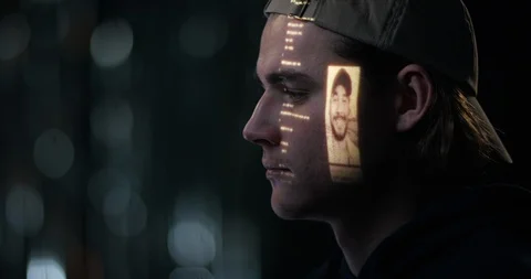 Young man hacking with projection on his face Video stock 101683373
