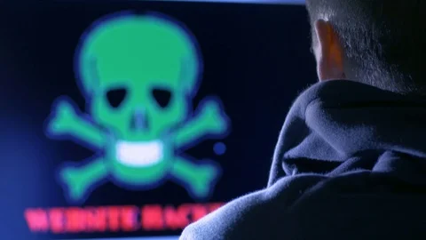 Young man hacking the website on the computer Stock Footage 72468052