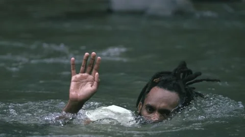 A Young Man Half Drowned Asking For Help in The River Stock Footage 209136657