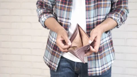 Young Man hand open an empty wallet closeup wallets without money financial Video stock 336450425