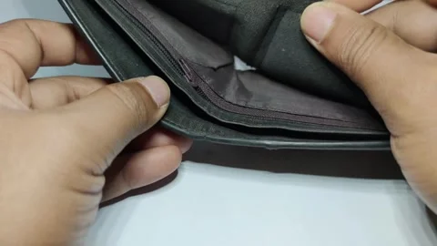 Young Man hand open an empty wallet closeup wallets without money financial Video stock 336450433