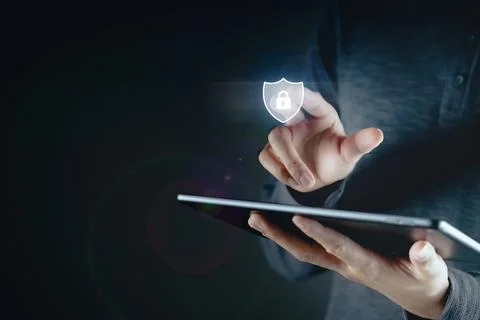 Young man hand touching on virtual Screen Padlock Icon. data protection, in.. Stock Photos