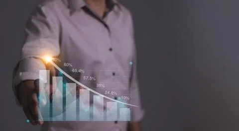 Young man hand touching to visualize money growth The phone screen displays.. Stock Photos