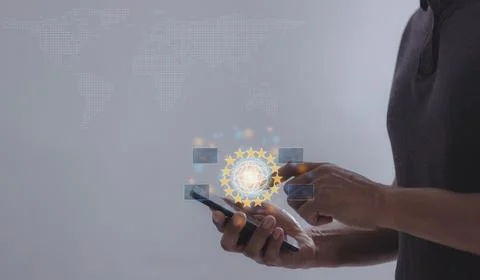 Young man hand using smartphone to Interconnect, Interconnected Concept; Pe.. Stock Photos