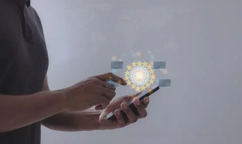 Young man hand using smartphone to Interconnect, Interconnected Concept; Pe.. Stock Photos