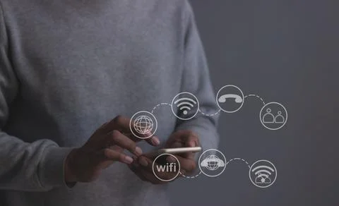 Young man hand using smartphone with to Interconnect, Interconnected Concep.. Stock Photos