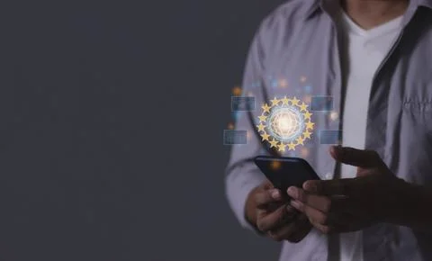 Young man hand using smartphone to Interconnect, Interconnected Concept; Pe.. Stock Photos