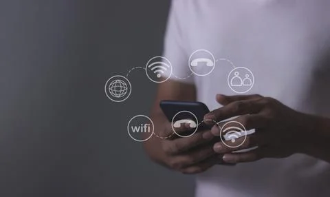 Young man hand using smartphone with to Interconnect, Interconnected Concep.. Stock Photos