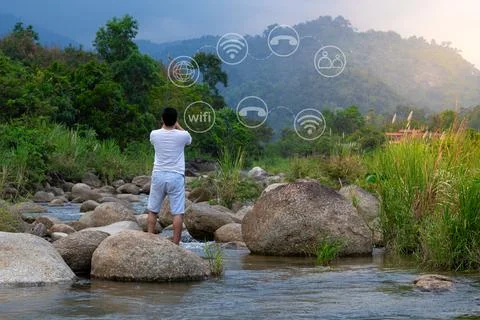 Young man hand using smartphone with to Interconnect, Interconnected Concep.. Stock Photos