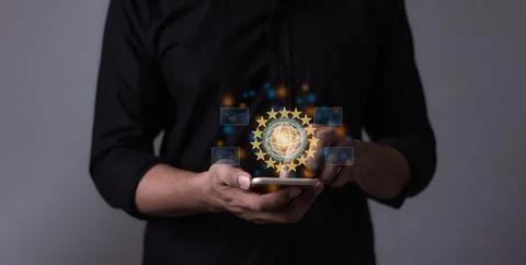 Young man hand using smartphone to Interconnect, Interconnected Concept; Pe.. Stock Photos