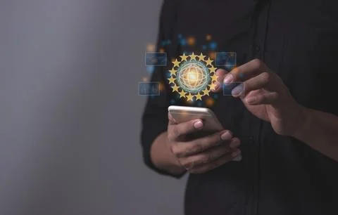 Young man hand using smartphone to Interconnect, Interconnected Concept; Pe.. Stock Photos