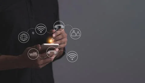 Young man hand using smartphone to Interconnect, Interconnected Concept; Pe.. Stock Photos