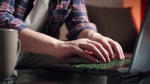 Young man hand work on laptop computer at home table close up shot Stock Footage 209306192