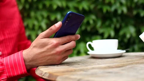 Young man hands using smartphone close-up. Stylish businessman surfing online 스톡 동영상 132549184