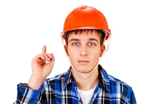 Young Man in Hard Hat Foto stock