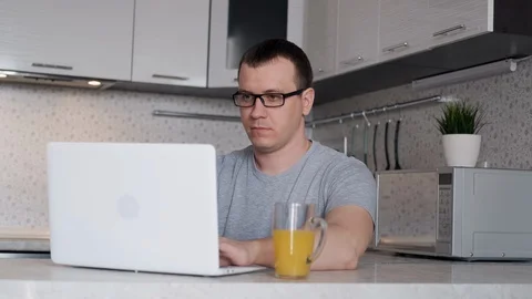 Young man has difficulty working remotely from home Stock Footage 127599642
