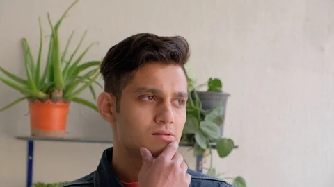 Young man has a eureka moment as he comes up with an answer to his problems that Stock Footage 101286855