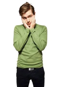 Young man has a problem, he's worried. Stock Photos